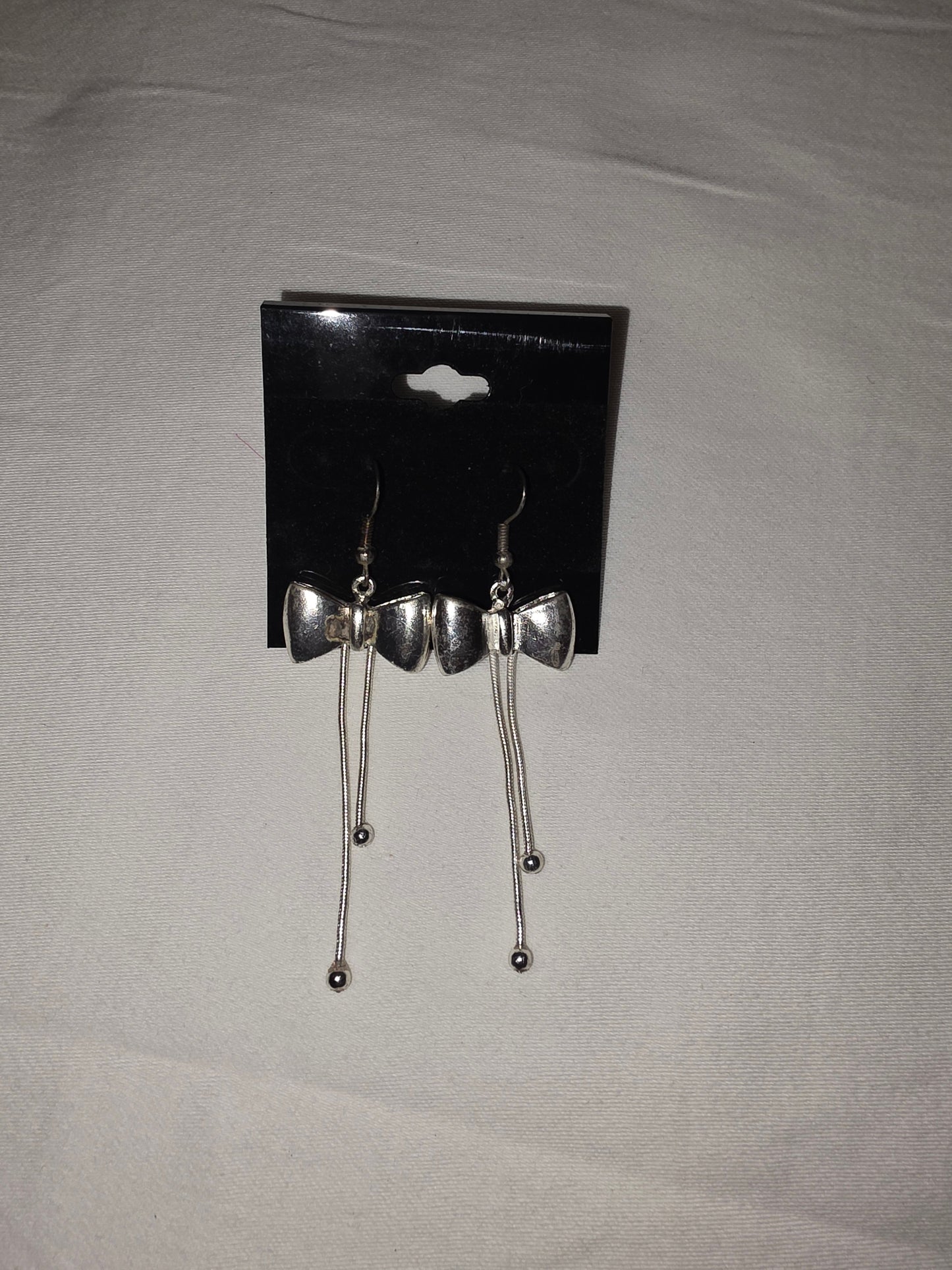 Silver - Tone Bow Dangle Earrings with Chain Drops - All Seasons Curves