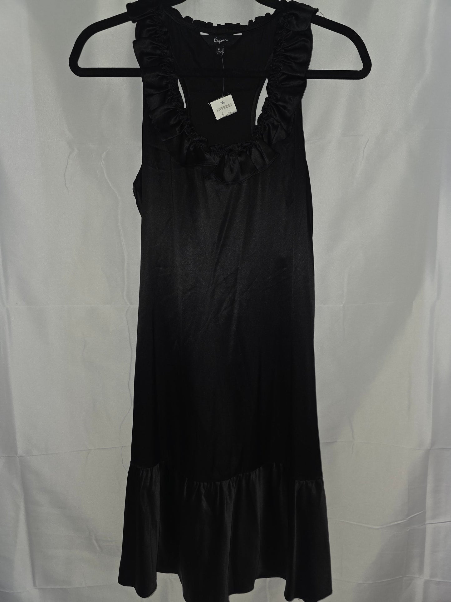 New Express brand Medium sleeveless black dress features a ruffle V - neckline - All Seasons Curves