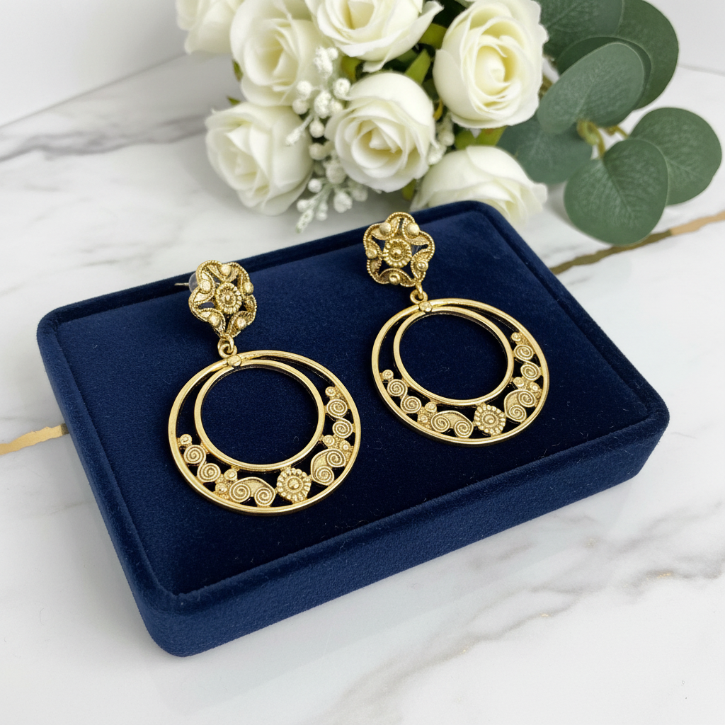 Artisan Elegance: Gold-Tone Filigree Dangle Earrings