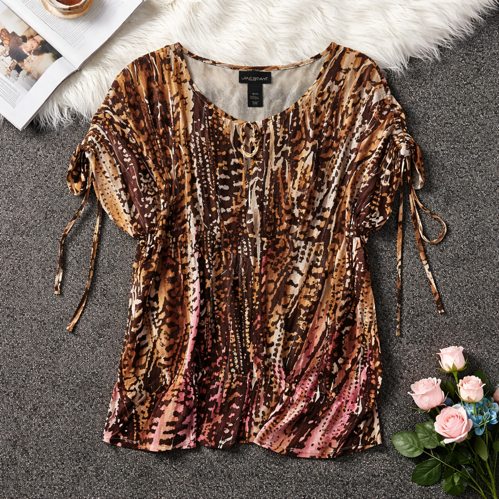 Lane Bryant blouse features a lightweight, semi-sheer chiffon fabric. Size 18/20