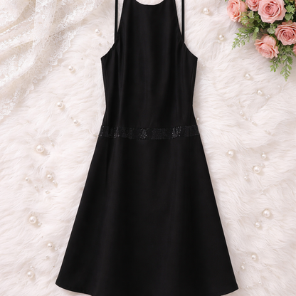 Calvin Klein sleeveless dress features a sleek, high-neck halter silhouette that elegantly highlights the shoulders. Size 12