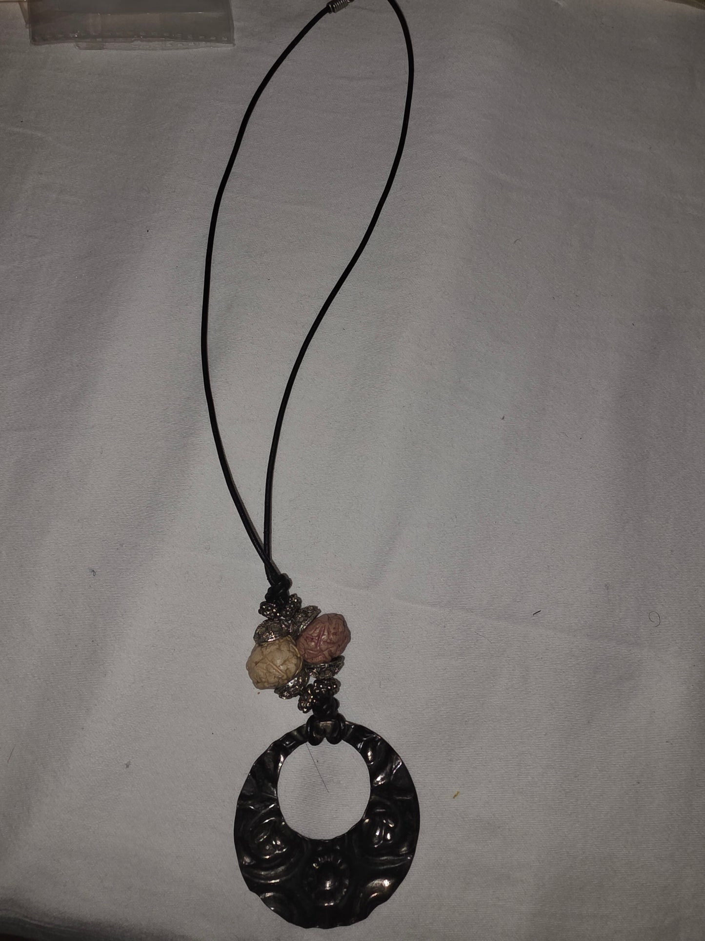 Bohemian Hammered Metal O-Ring Necklace | Black Cord Statement Pendant with Artisan Nut Beads